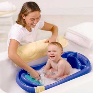standard plastic baby bath tub with mom washing baby
