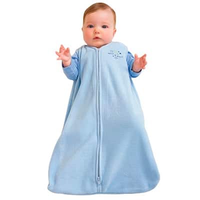 baby covered by blue sleep sack