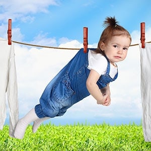 baby drying on washing line