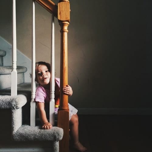 baby sitting on stair