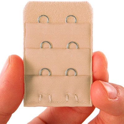 2 hook bra extender held between two fingers