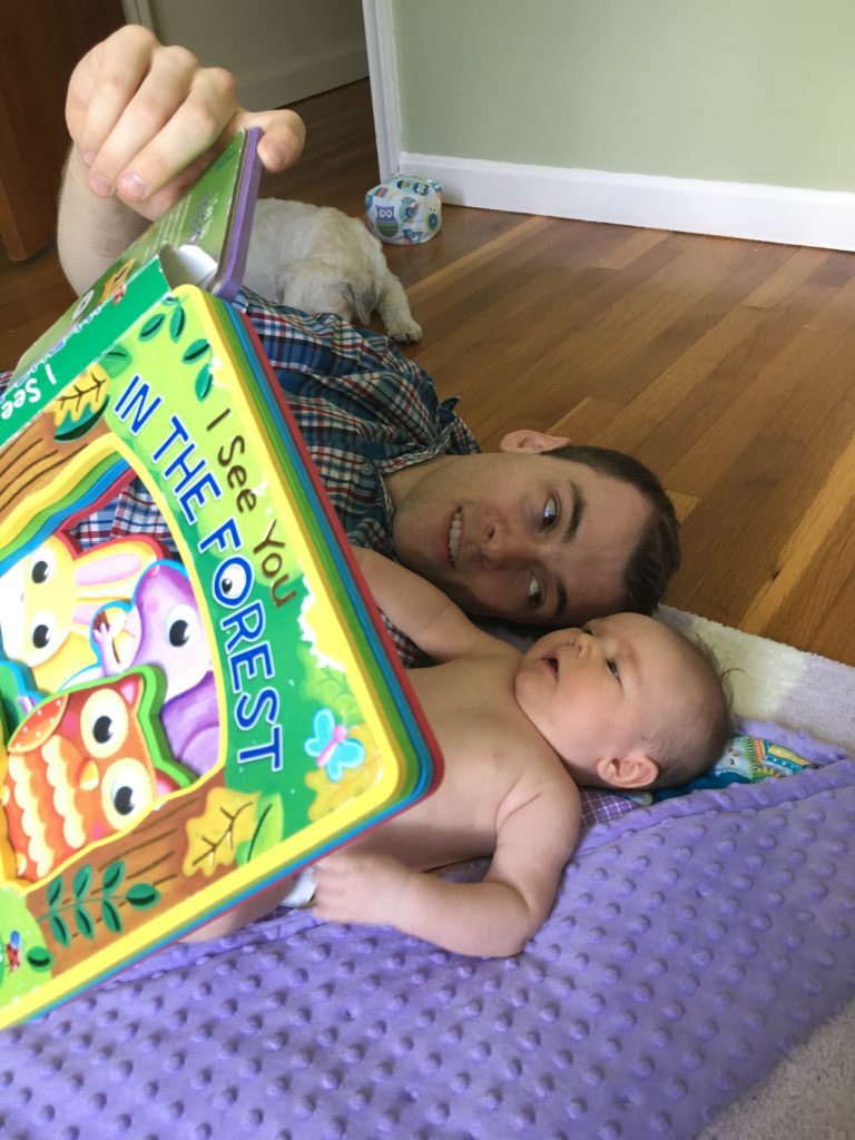 dad bonds with newborn
