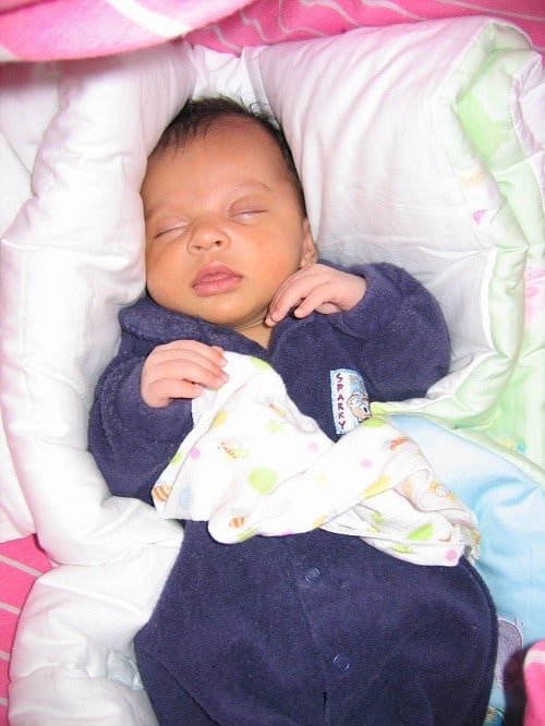 baby sleep in hammock with comforter