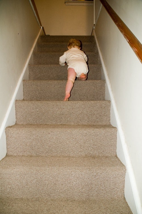 baby climbing in stair