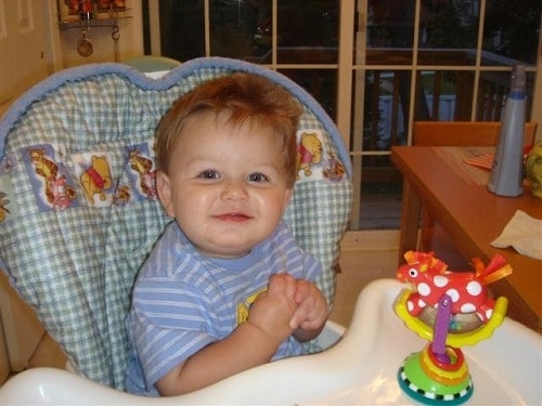 baby comfortably sitting in highchair