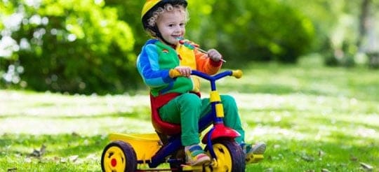 baby in tricycle