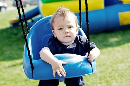 baby in blue swing