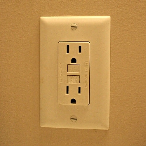 socket on the brown wall