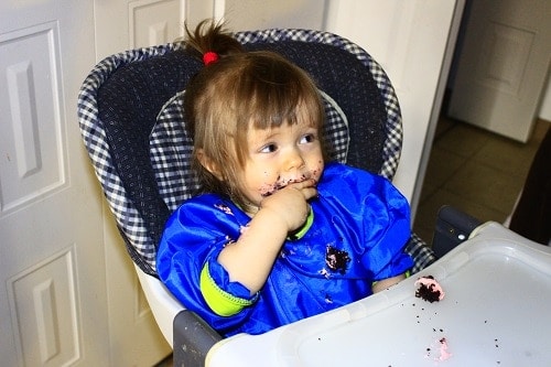 baby eating cupcake