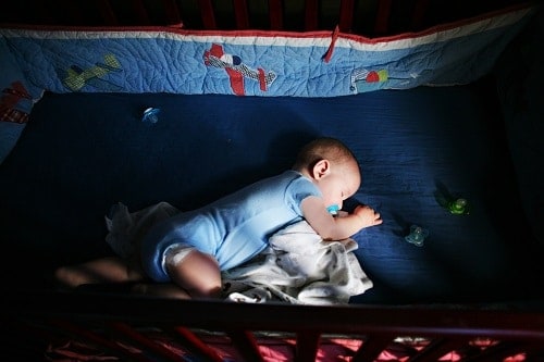 baby sleeping in crib
