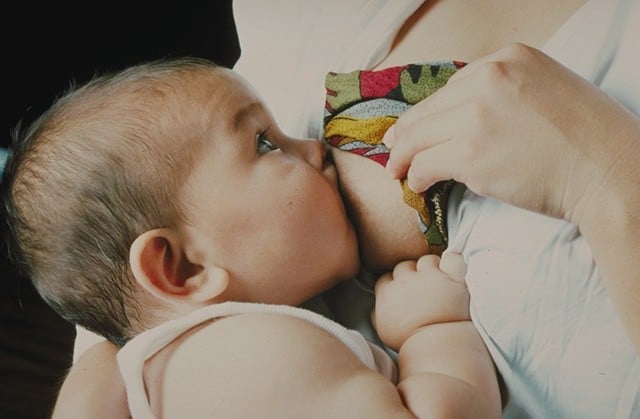 mom breastfeeding baby