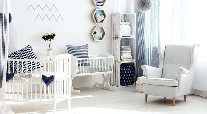 nursery glider placed in nursery room