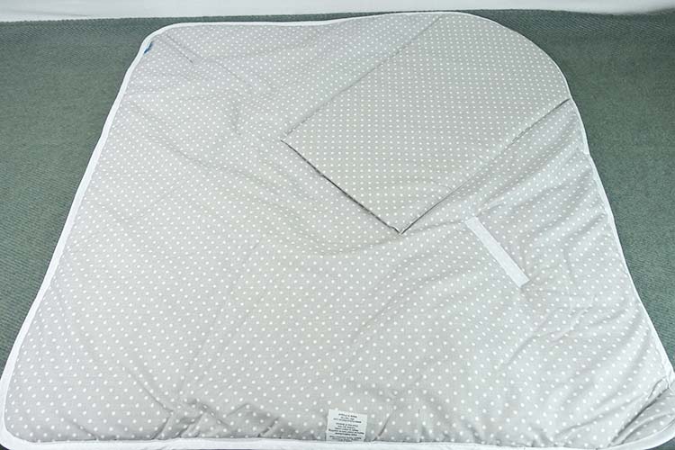 Bundlebee Baby wrap unfolded into baby play mat