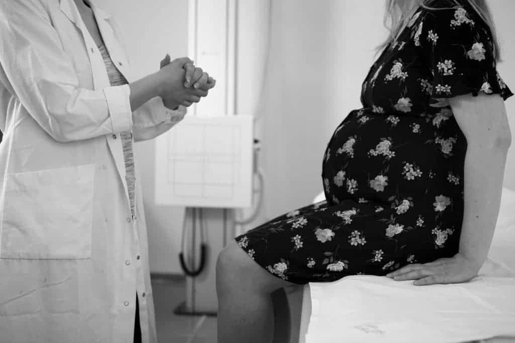 OB/GYN meeting pregnant woman