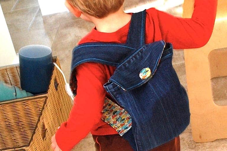 toddler with back pack