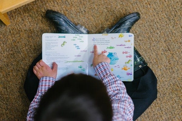 A boy reading book