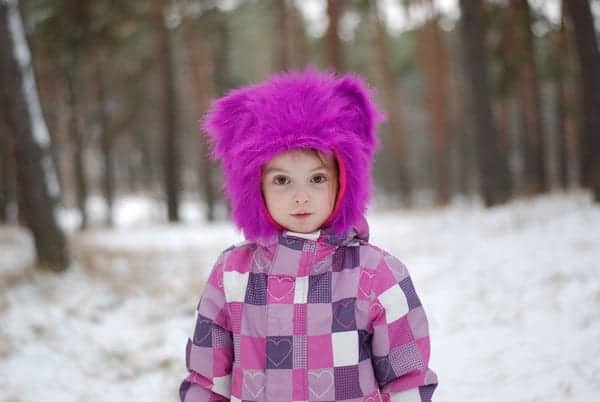 Child in Pink snowsuit