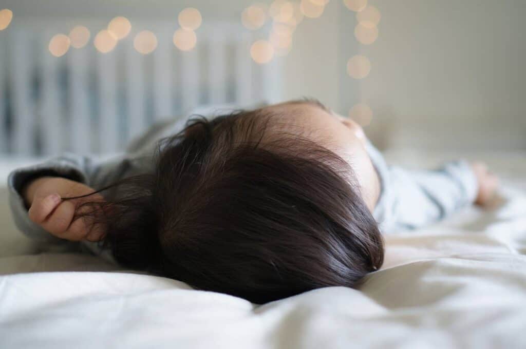 Baby In Bed