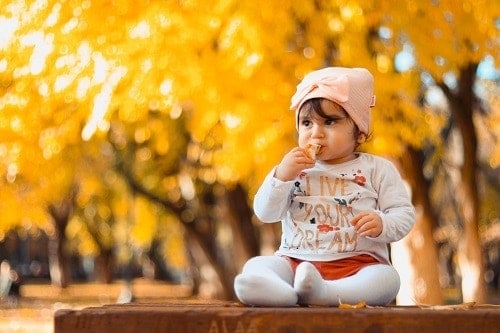 baby sitting on top of table