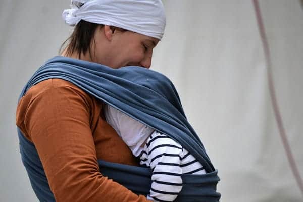 baby sling with her mother