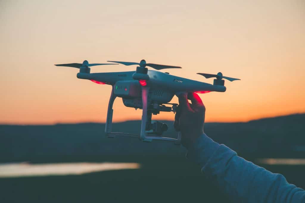 person holding a drone