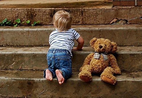 baby with teddy bear