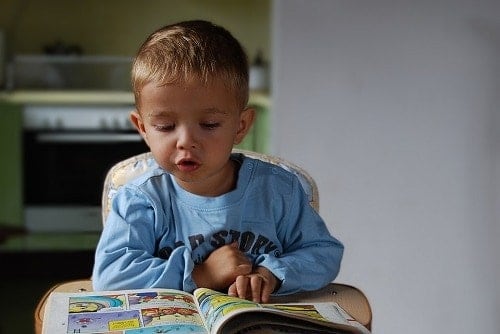 baby boy is reading