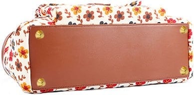 diaper bag with metal feet on the base of the bag