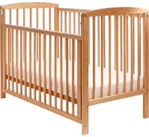 drop side baby crib with side rail dropped down