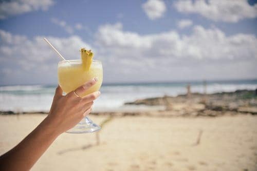 hand holding glass of shake