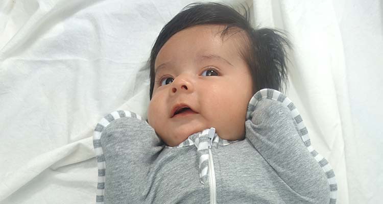 happy baby in love to dream swaddle up