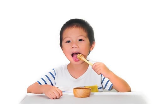 Child wearing white t-shirt