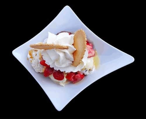 Strawberry sundae in a white plate