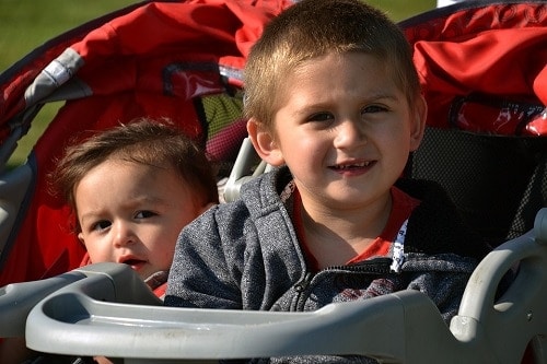 two kids in stroller