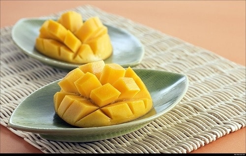 two sliced mango