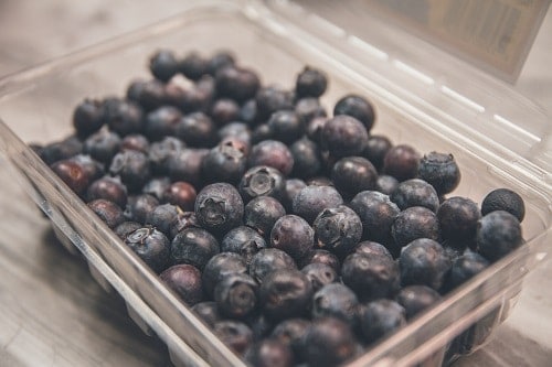 blueberries on clear plastic case