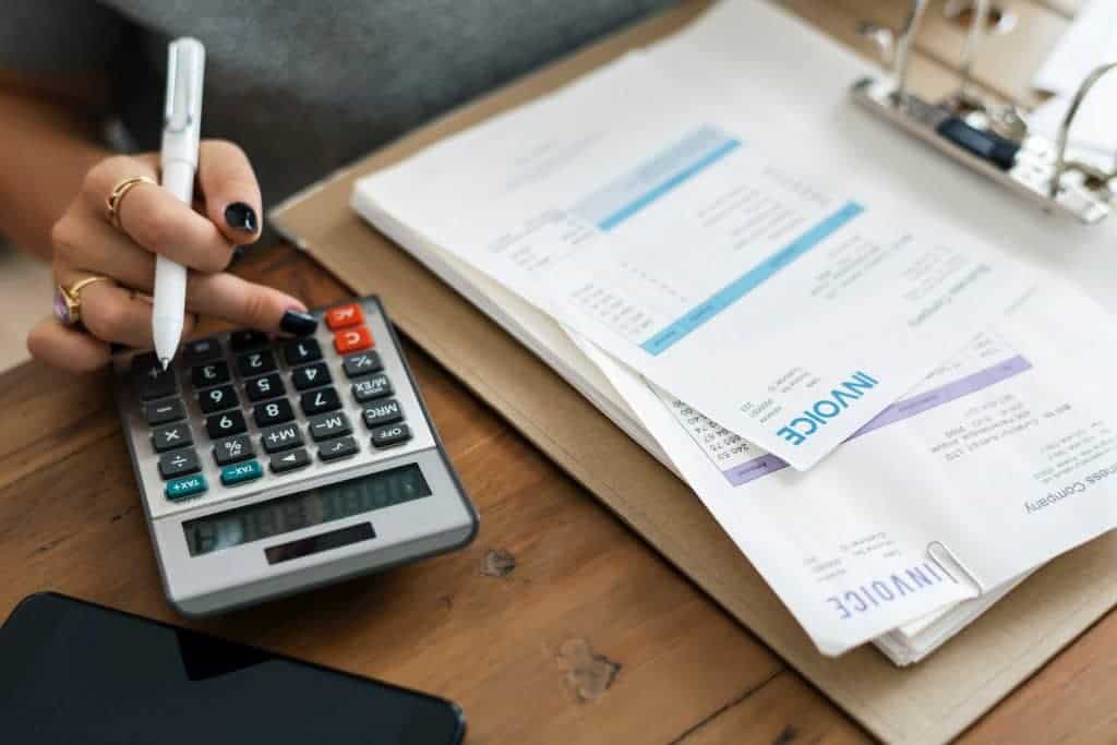 woman calculating invoices
