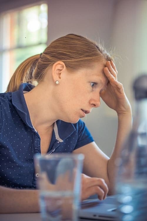 stress woman wearing blue shirt