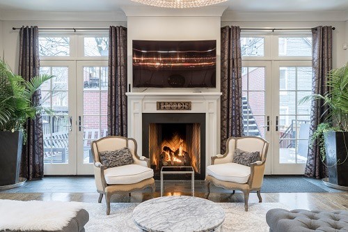 fireplace with two chairs