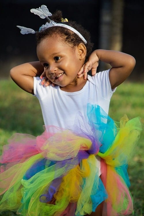 girl wearing tutu and white shirt