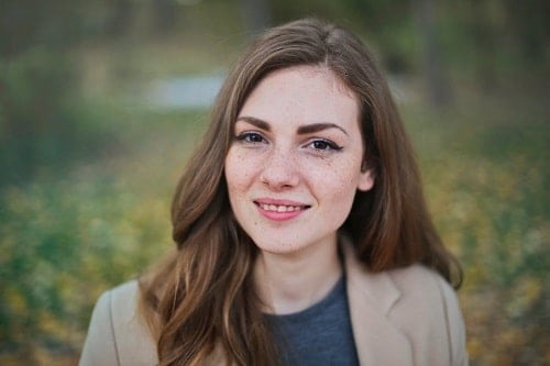 girl smiling with freckles