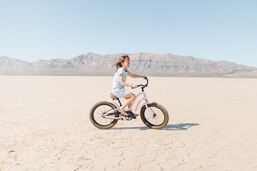 girl playing bike outdoor