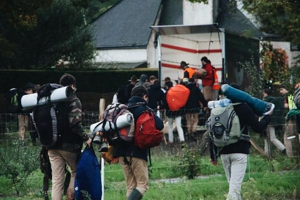 People bringing backpack