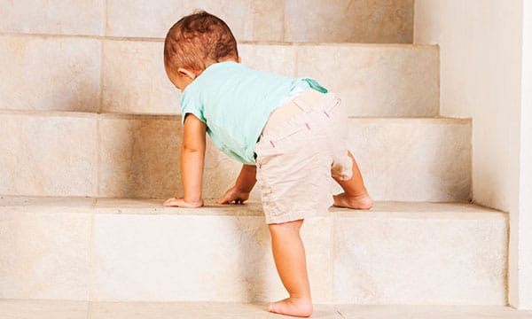 when do babies crawl up stairs