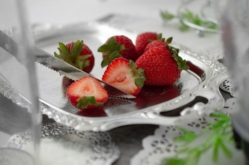 Red strawbwrries on gray tray