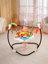 baby jumping in a stationary activity jumper