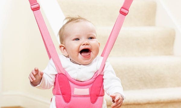 baby happy in her pink door baby jumper