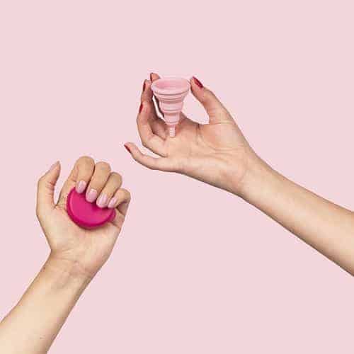 menstrual cup with pink background