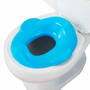 regular potty seat sitting on top of toilet seat