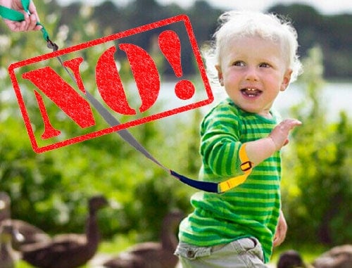 child walking with a wrist leash for safety